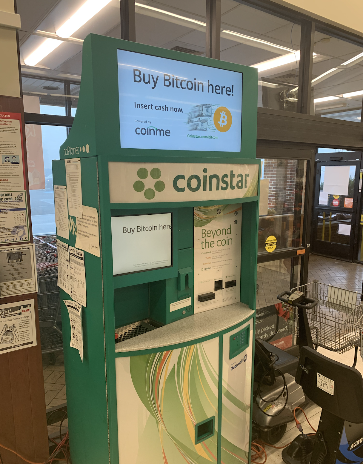 Grocery digital out-of-home screen by Coinstar
