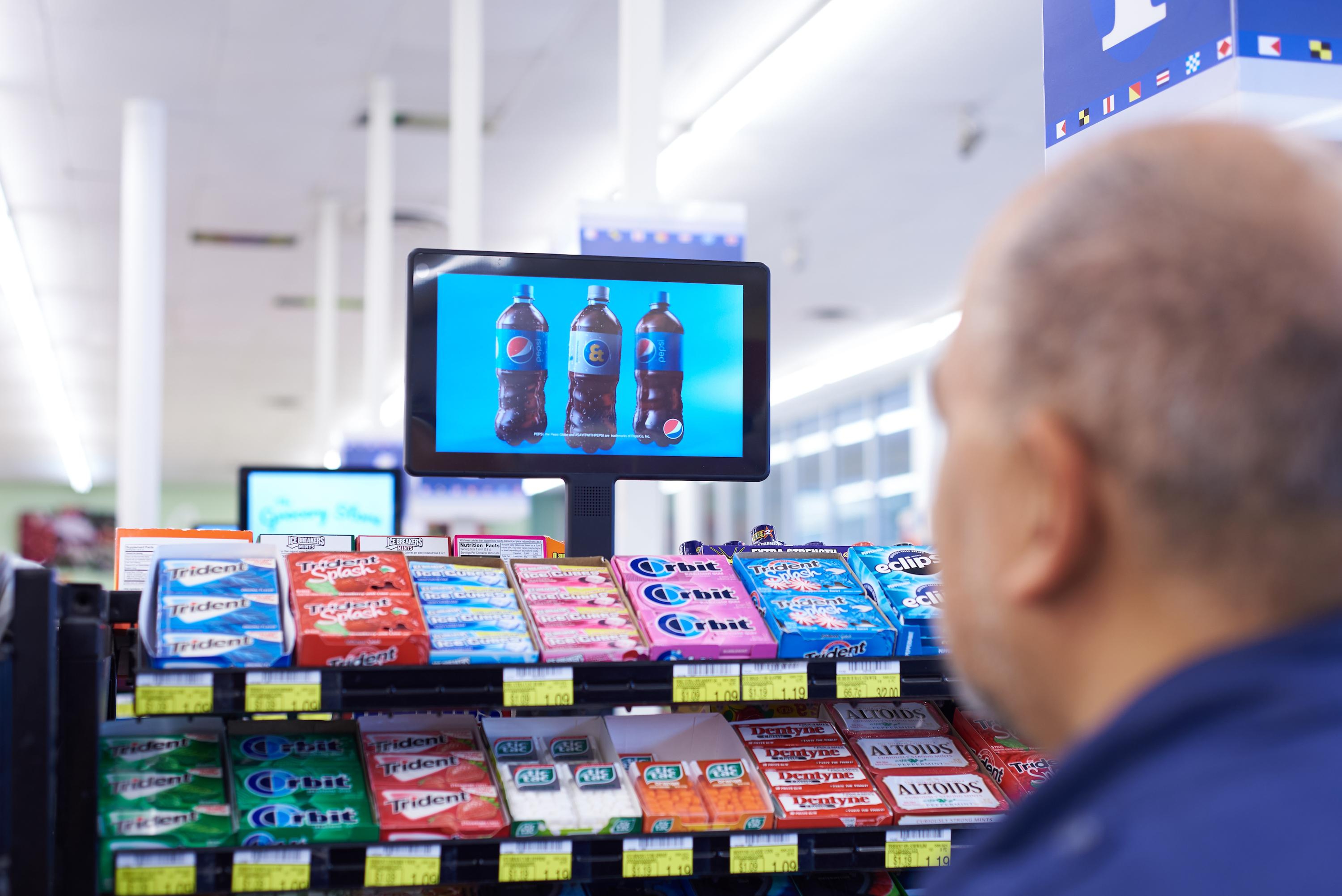 Grocery digital out-of-home screen by Grocerytv